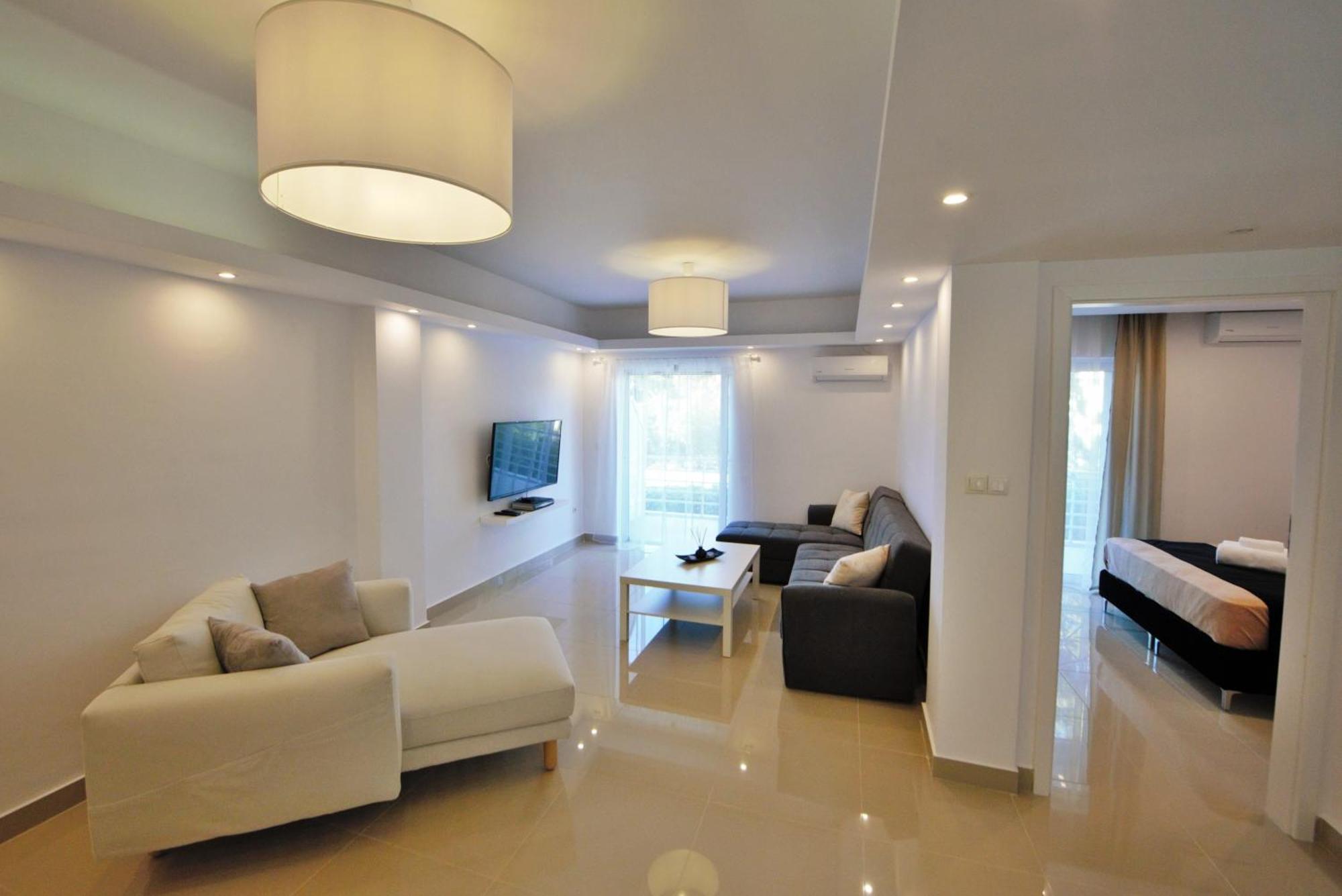 Athena Apartment Artemida  Bagian luar foto
